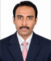 Dr. Ganesh E